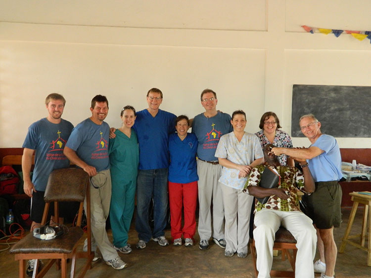 Group picture of Dr's providing dental care to people in Togo.