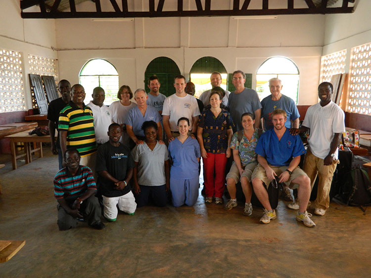 Group picture of Dr's providing dental care to people in Togo.