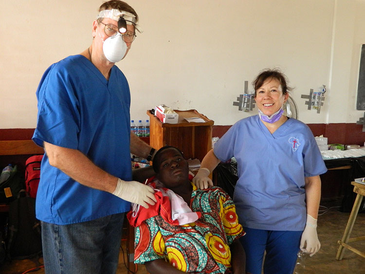 Dr. Pruitt on mission in Togo providing dental care .